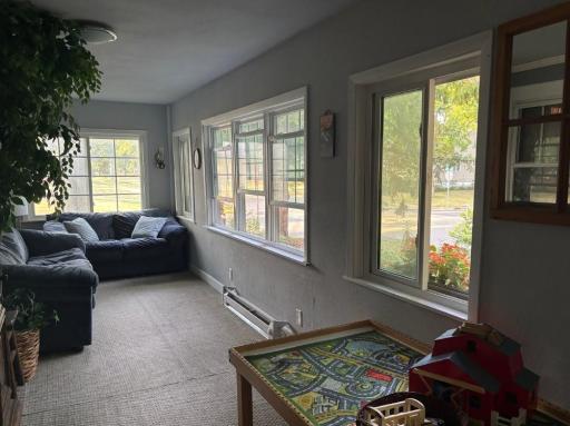 4-Season porch to enjoy the neighborhood and nature