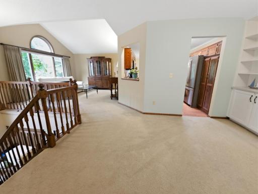 top of the stairs, in dining room