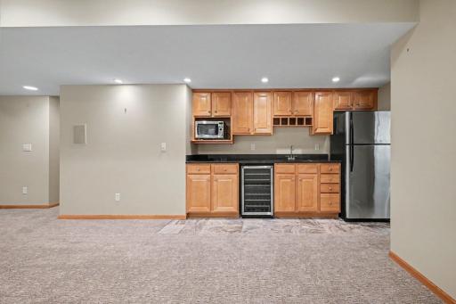 Kitchenette / wet bar - Stainless steel options, custom cabinets, wine cooler, microwave