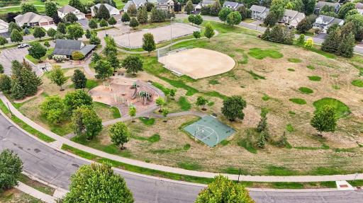Peter Thompson park at the center of the community. Ball fields, a playground, sidewalks for daily walks, and more