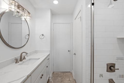 Clean and bright with great storage in the main floor bath.