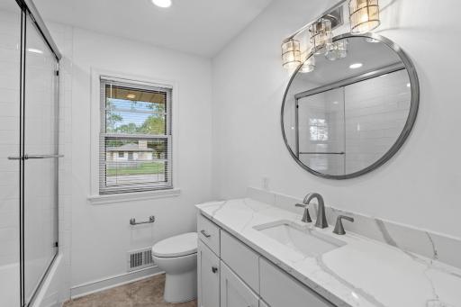 Main floor bath nicely updated with timeless upgrades.