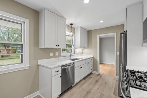 This galley kitchen offers lots of light, good design and durable flooring.
