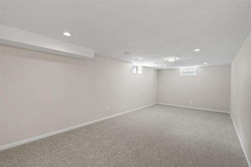 Lower level family room has brand new carpet , good natural lighting and lots of space.