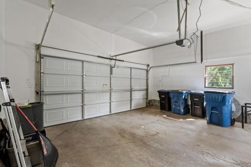 This garage..is HUGE! Spacious with these high ceilings..so much room to work on things or for storage.