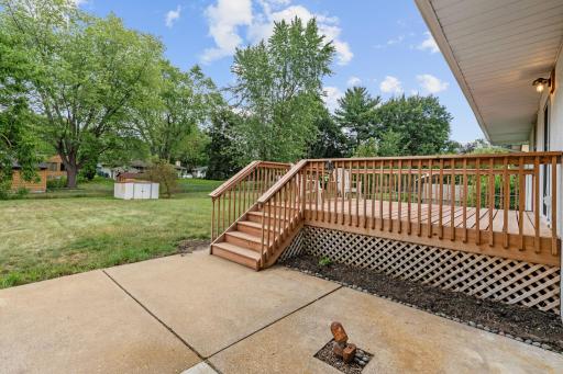 Concrete patio area just off the deck and outside the garage