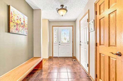 Large entry way greets your friends and family with a nice built in bench