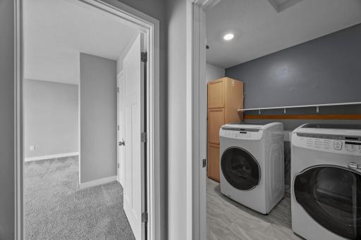 Upper level laundry with dual-load units