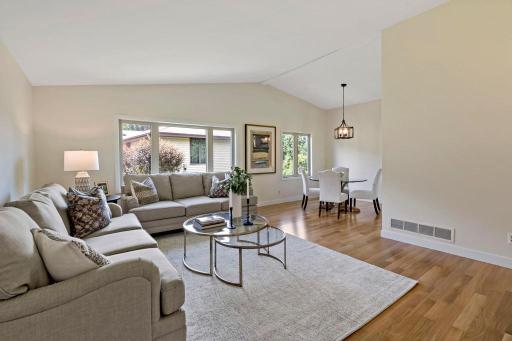Step inside to the vaulted ceiling living room which is great for entertaining