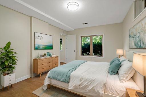 Virtually staged lower level bedroom