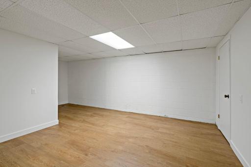 Second versatile lower-level flex room ideal for a home office, exercise room, craft room, or hobby space.