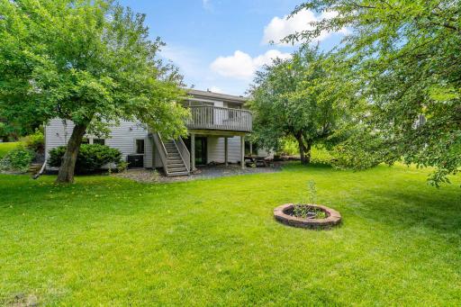Spacious backyard situated on a lovely pond