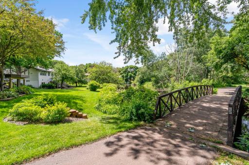The home sits on a private pond with trails