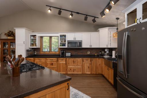 Kitchen, master bath and lower level living room done in Gorilla flooring.
