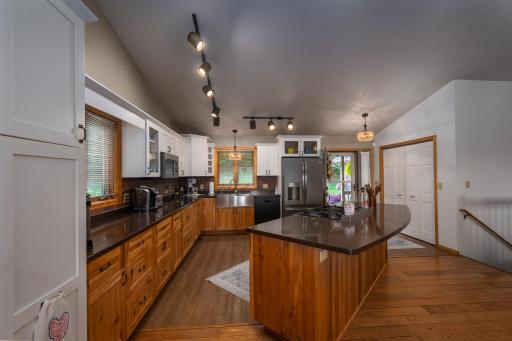 Extra counter space, gathering spaces kitchen island