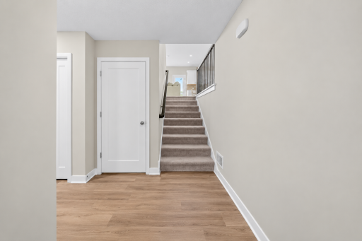 Front Entry – Step inside to a bright, welcoming entryway with clean neutral finishes and an open feel that leads into the main living spaces.