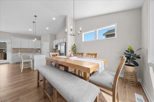 Open dining area flows seamlessly into the kitchen