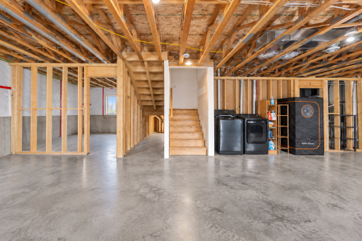 Lower Level – Expansive unfinished lower level ready for your personal touch, with plenty of space to customize and create additional living areas to fit your needs.
