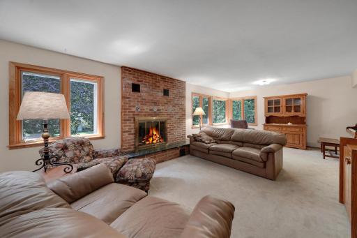 Living room/dining room area that is 29 feet in length. Currently dining area used for piano and sitting area. Replaced woodburning fireplace in 2015.