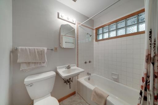 Full ceramic bath off primary bedroom.