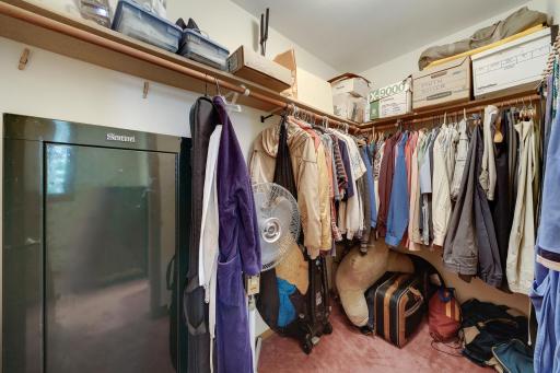Primary bedroom walkin closet.