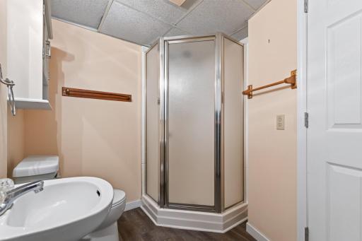 The 3/4 lower level bath has access from the 3rd bedroom as well as the laundry room.