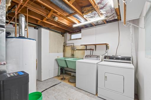 Good sized laundry room with double sinks. Newer mechanicals as well.