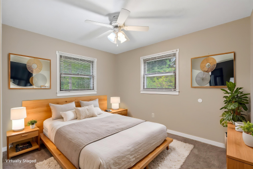 This is the 2nd bedroom on the main floor which can be used for many things. You can use it as a regular bedroom or a kids bedroom.