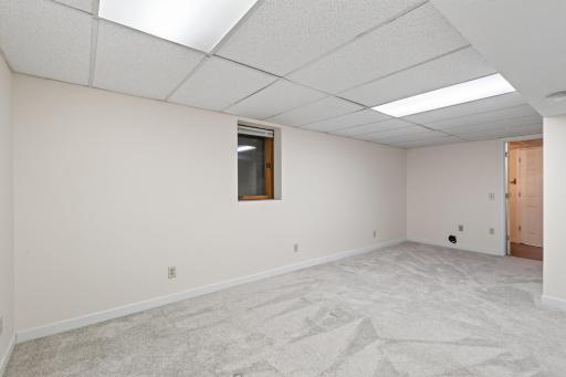 This room is right off of the lower level family room, with a large closet and access to the 3/4 bath.