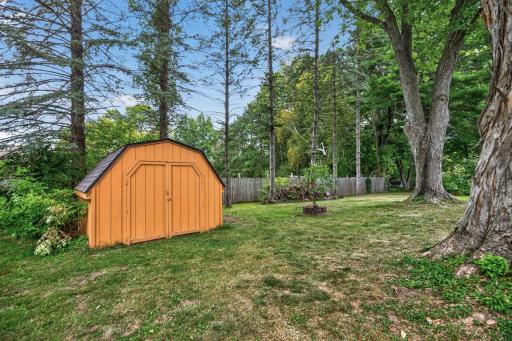Large shed that can easily hold all of the yard tools as well as a large mower. Great outdoor storage space.