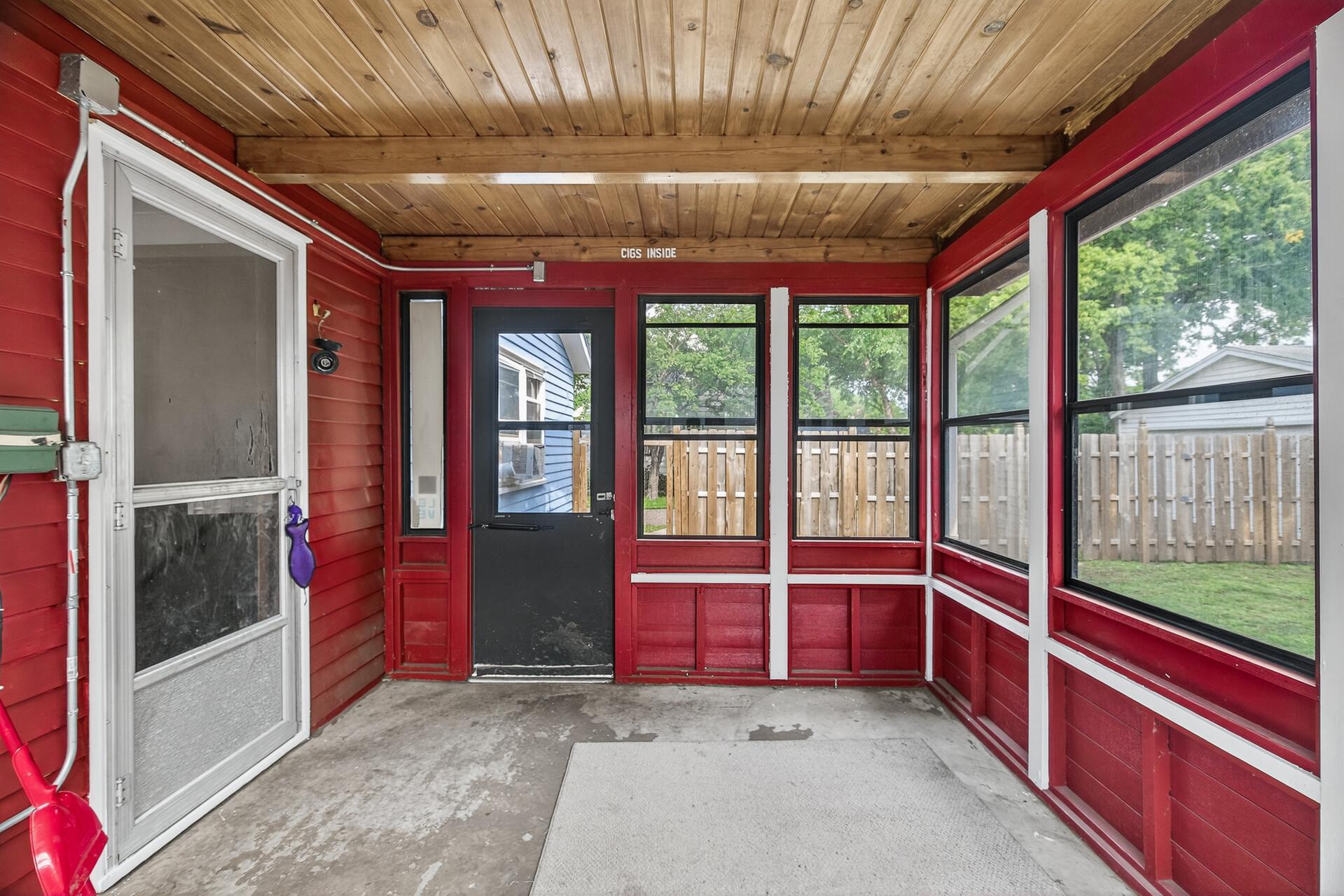 Porch has tremendous potential and looks out over private backyard