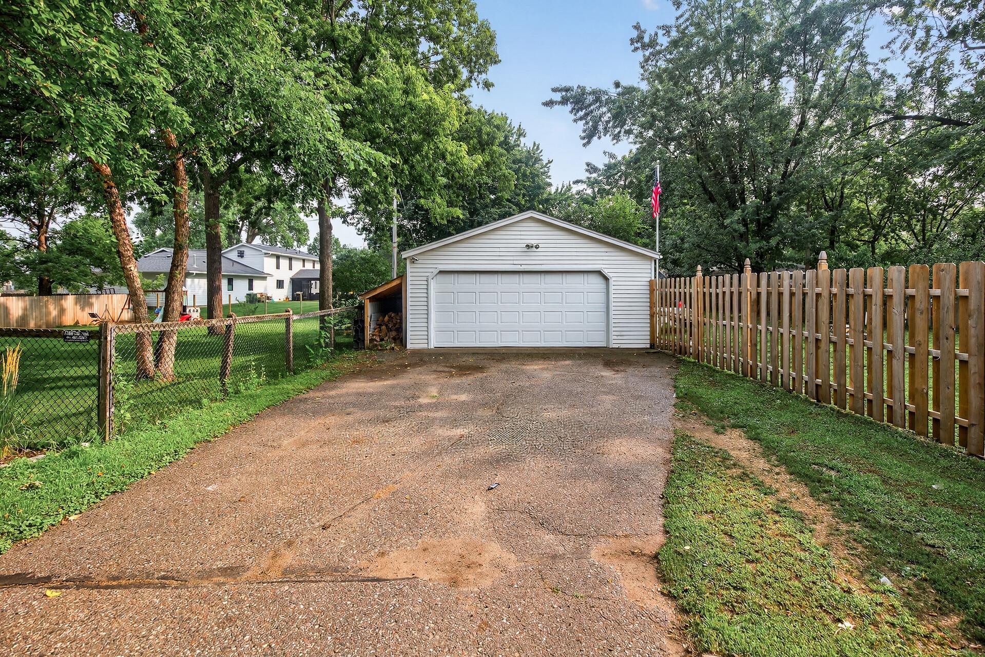 Two car garage and ample driveway space for parking