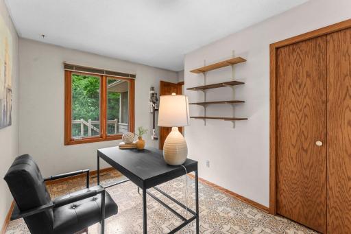 The primary bedroom also connects to the second bedroom, which is additionally accessible from the family room and offers ample closet space and a large rear-facing window.