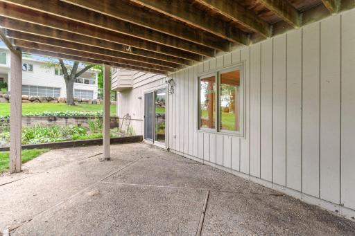 The walkout patio provides an inviting space to enjoy the backyard.
