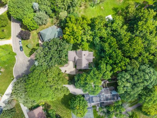 An aerial view of the home nestled peacefully within a quiet cul-de-sac.
