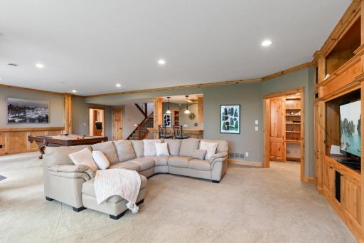 Whether hosting game night, enjoying movie night, working out, or gathering with family and friends, this versatile space is designed to accommodate it all.