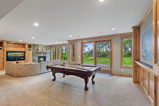 Whether hosting game night, enjoying movie night, working out, or gathering with family and friends, this versatile space is designed to accommodate it all.