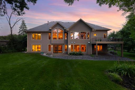 Attractive curb appeal, quality siding, architectural details, and an inviting front porch create a warm first impression, while the private, tree-lined setting provides exceptional tranquility.