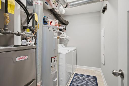 Convenient upper-level laundry room with washer and dryer included.