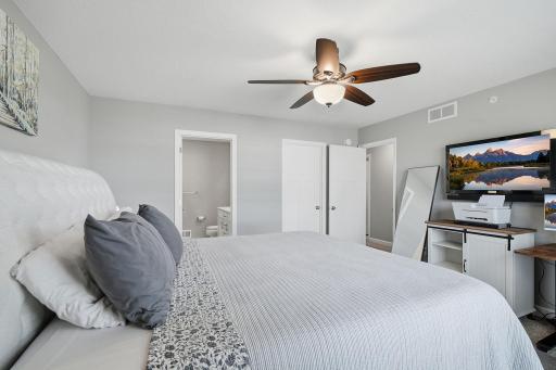 Primary suite includes a private bathroom and walk-in closet.
