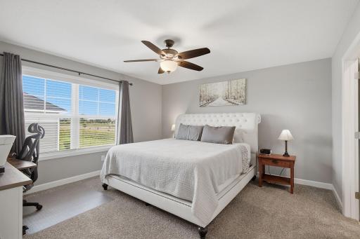 Large primary bedroom with plenty of room to create your own private retreat.