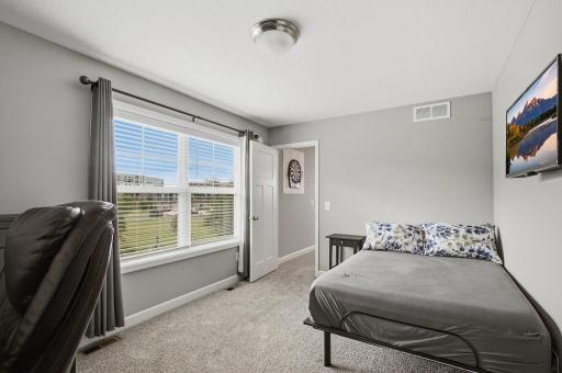 Generously sized second bedroom with great natural light.
