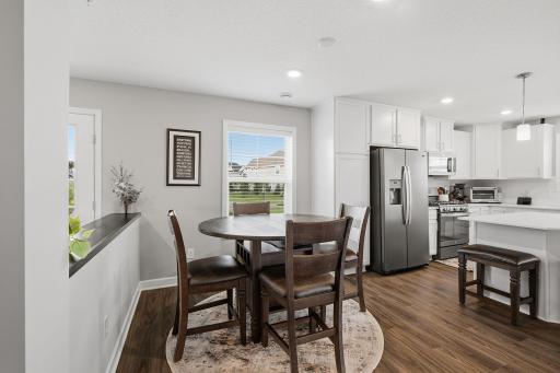 Informal dining space conveniently located between the kitchen and entry.
