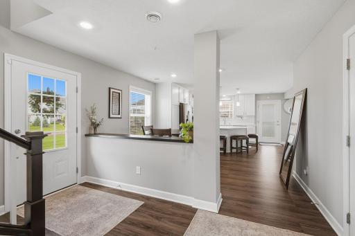 Bright, open main level with an easy flow between the kitchen, dining and living spaces.