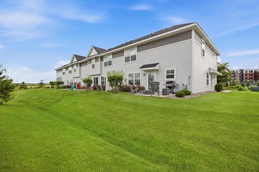 Enjoy the benefits of an end unit with additional green space right outside your door.