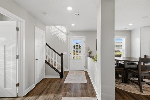 Welcoming entry into this beautifully maintained, move-in-ready home.