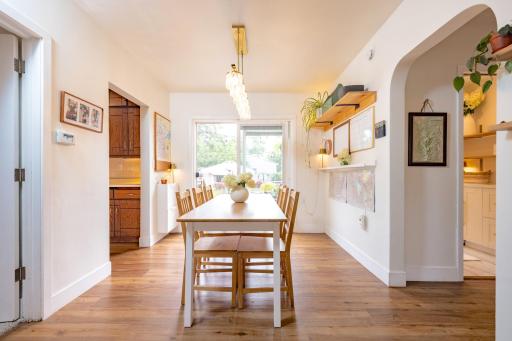 Spacious dining room with a sliding door leading out to your own private outdoor oasis