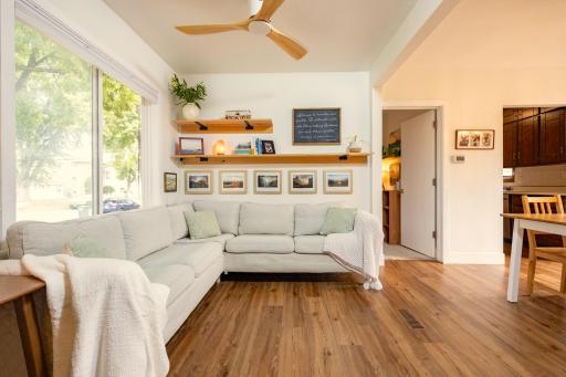 Bright living room with tons of natural light through the newer large windows