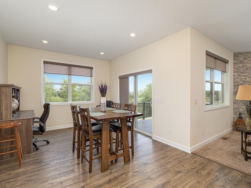 The dining room allows easy access to the covered back deck thru patio door.