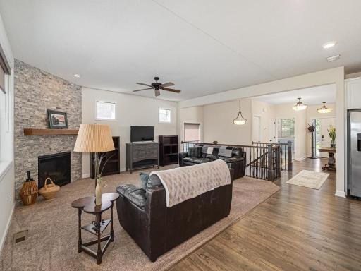 Beautiful stone accent highlights the gas fireplace which is ready to warm you up this winter. The two small upper wall windows allow the natural light in but maintain your privacy.